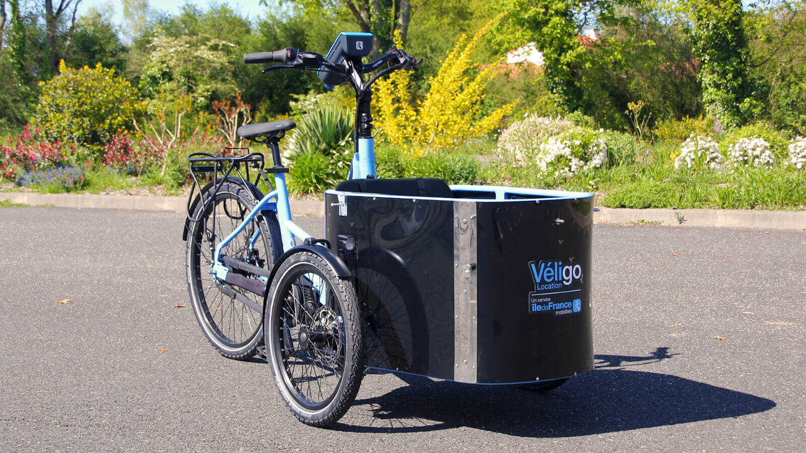 Un triporteur NIHOLA aux couleurs de V&eacute;ligo